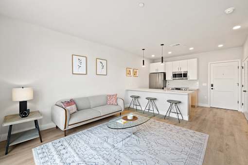 a living room with a couch and a table