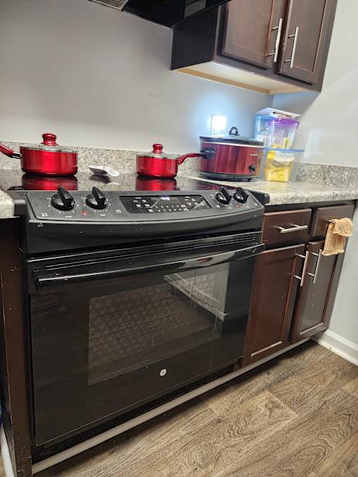 Modern kitchen with black oven  at The Assembly Apartments, Greenville