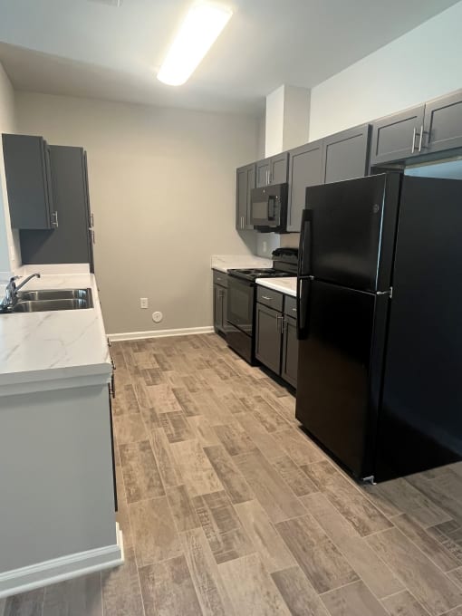 Kitchen With Black Appliances at Gentry Place, South Carolina