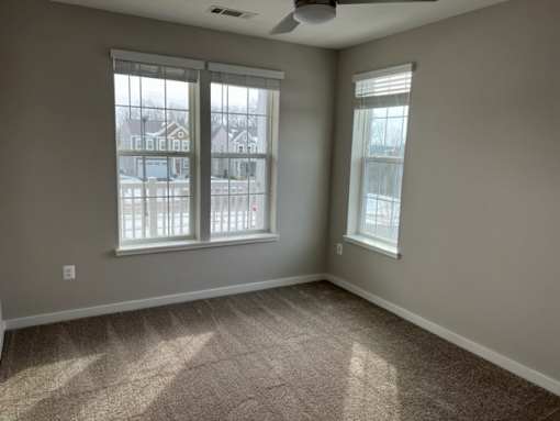 Bedroom With Expansive Windows at Poland Hill Senior Apartments, Chantilly, VA, Virginia, 20152
