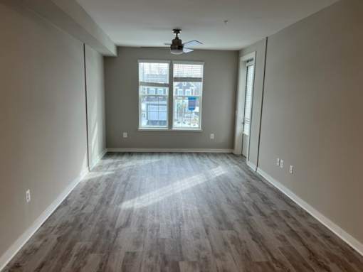 Living Room With Expansive Window at Poland Hill Senior Apartments, Chantilly, 20152