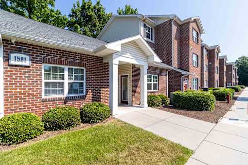 A row of houses with number 1501 on the first one. at The Shire Apartments, Chesapeake, VA
