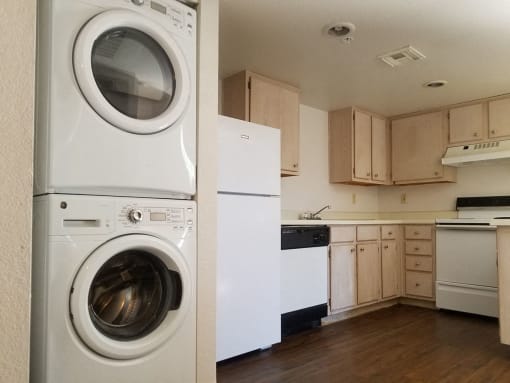 In-unit washer and dryer and kitchen at university west apartments in flagstaff az