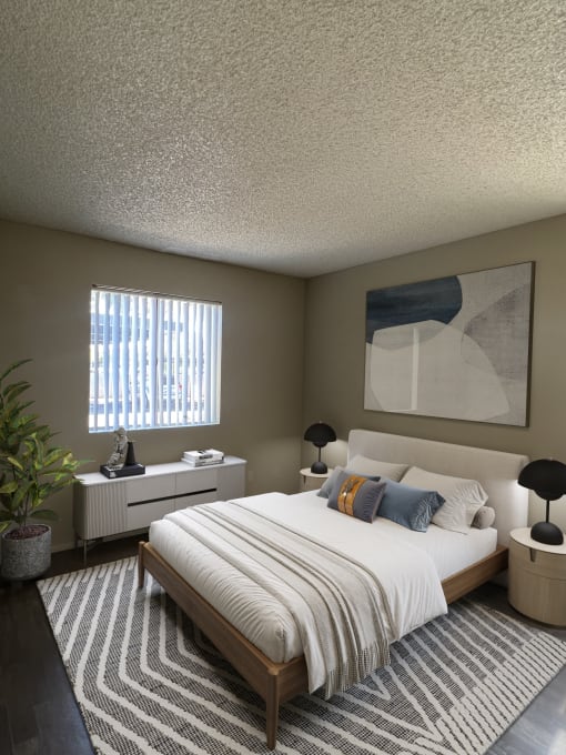 a bedroom with a bed and a dresser and a window