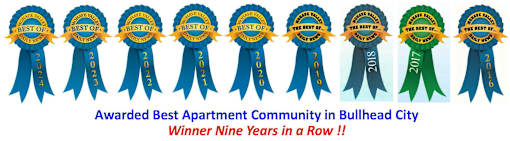 A series of ribbons indicating the awarding of the best apartment community in Bullhead City for nine consecutive years.