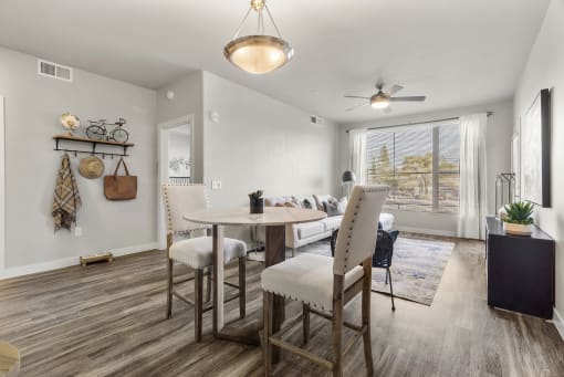 Dining area and living room at V on Broadway Apartments in Tempe AZ November 2020