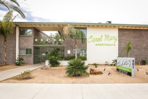 Exterior, landscaping & signage at Carol Mary Apartments in Phoenix, AZ