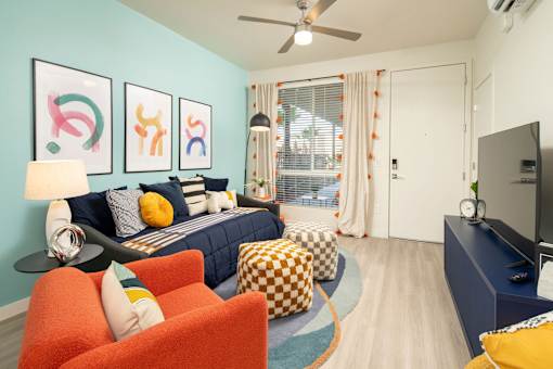 Living room and bedroom of Studio at Streamliner 87th Apartments