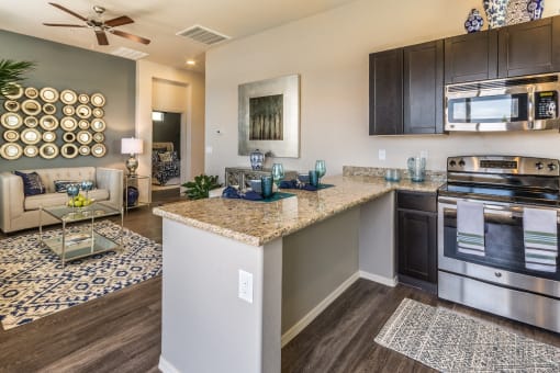 Living Room, Kitchen & Dining Area (2 Bedroom) at Palm Valley Villas in Goodyear, AZ