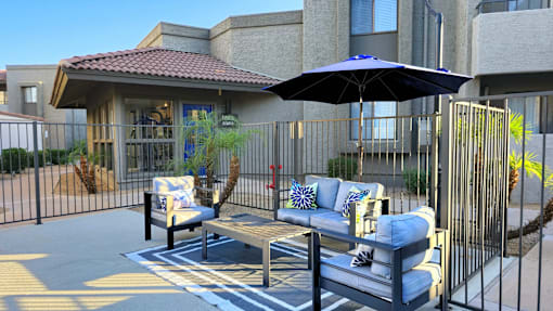 Pool Seating Area and Gym Entrance at Olive East Apartment in Gilbert Arizona 2025.png