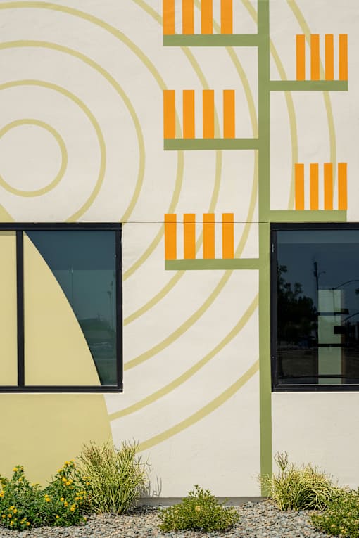 A wall with a pattern of circles and rectangles.