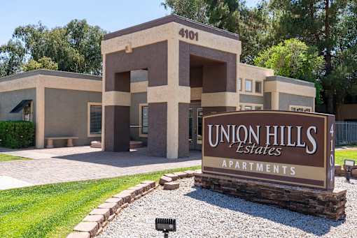 The image shows a building with the number 4101 and the name Union Hills Estates Apartments.