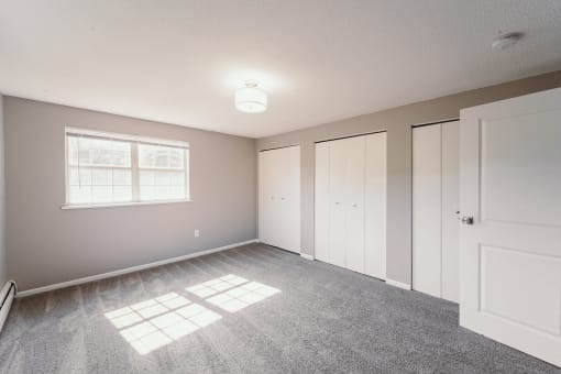 Carpeted Bedroom at BAY SHORE APARTMENTS, EAST HAVEN