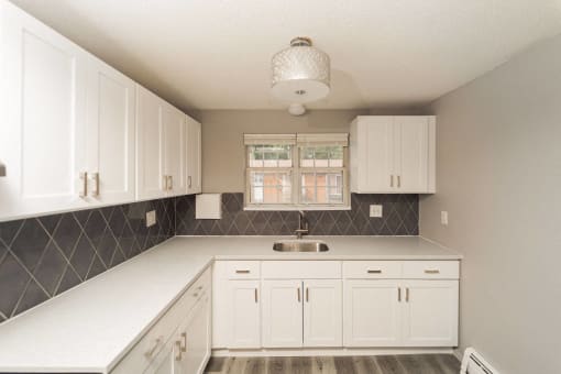 White Kitchen at BAY SHORE APARTMENTS, EAST HAVEN, CT