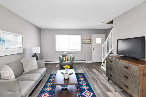 Living Room With TV at Encore 99, East Haven, Connecticut