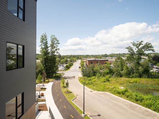 a view from a building of a road and a river