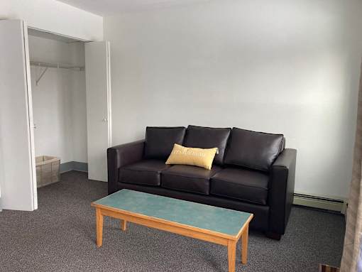 a living room with a couch and a coffee table