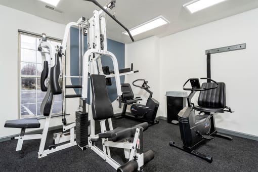 fitness center with adjustable weight lifting equipment