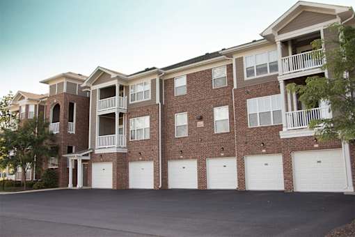 canon club at perry crossing apartment buildings with garage