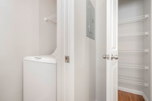 A white refrigerator freezer is in a kitchen.