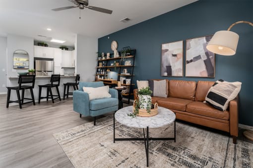 a living room with a couch and a table
