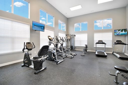 the gym at the flats at big tex apartments