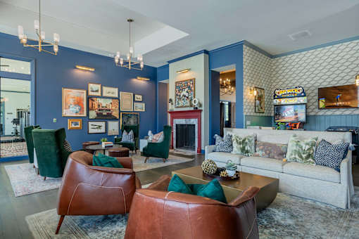 A living room with a fireplace and a couch.