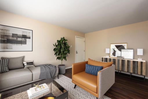 a living room with a couch and a chair