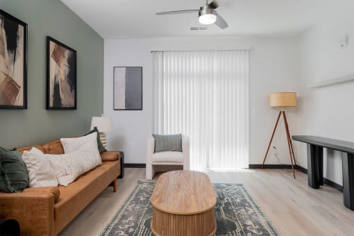 a living room with a couch and a table