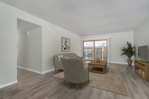 a living room with a couch and a table