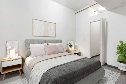 a bedroom with a bed and a closet