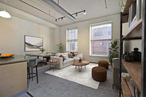 the living room of an apartment with a couch and a table