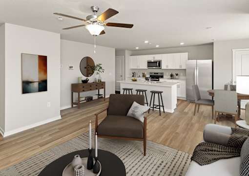 A modern living room with a brown chair in the center.