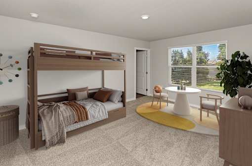 A bedroom with a large bed and a yellow rug.