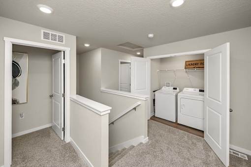 Laundry room with washer and dryer.