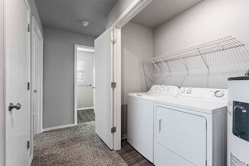 A laundry room with a washer and dryer.