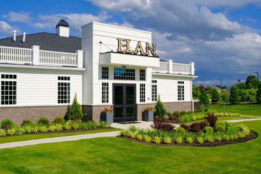 A white building with the word ELEAN on the front.