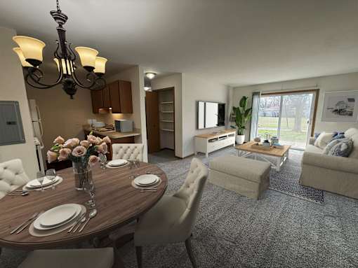 A dining room with a table set for two and a chandelier hanging from the ceiling.