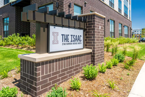 the isaac apartments roseville minnesota sign