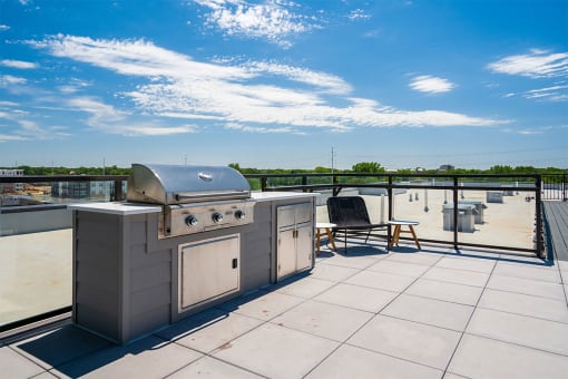 the isaac apartments roseville minnesota rooftop grilling station