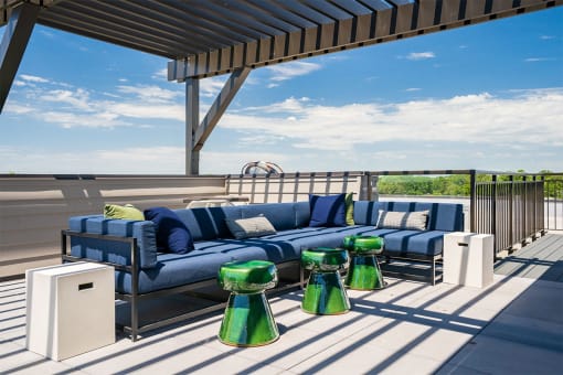 the isaac apartments roseville minnesota shaded rooftop lounge