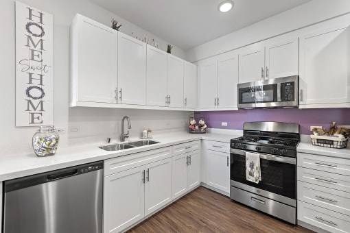 Chef-Inspired Kitchens Feature Stainless Steel Appliances at LEVANTE APARTMENT HOMES, Fontana, CA