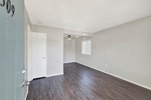 A room with a door and a window.