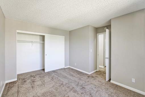 Spacious bedroom with walk-in closet at ELEVATE Apartments HOMES, Placentia, CA 92870