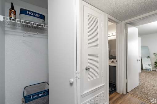 A white door with a sign that says "HOME" on it.