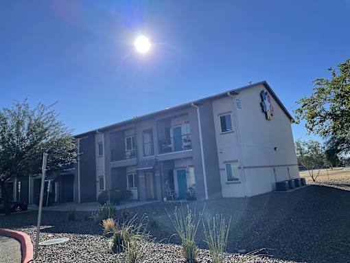 A sunny day at a modern apartment complex.