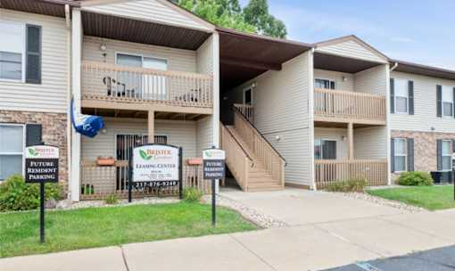 A sign for Bristle Leasing Center is in front of a building.