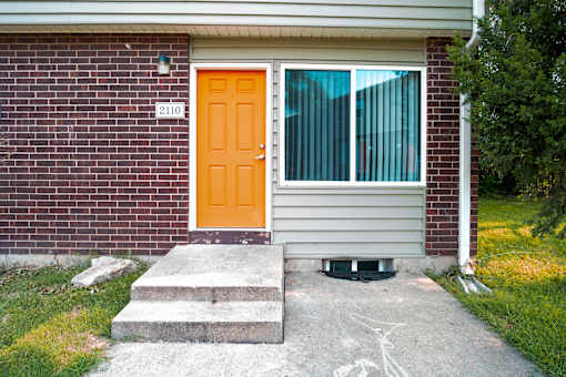 A house with a number 2110 on the front door.