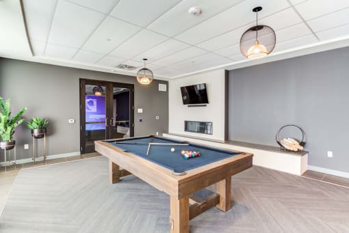 a pool table in the resident clubhouse