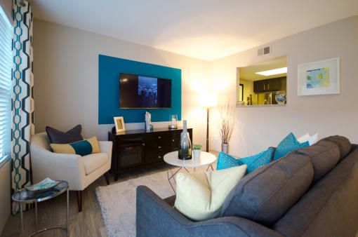 Living Room With TV at The Metropolitan in Lexington, KY